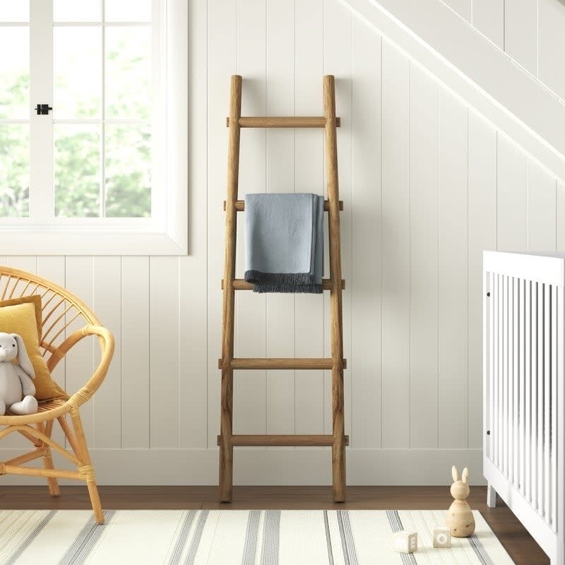 the blanket ladder with five rungs in a nursery
