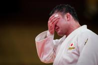 <p>Team Japan's Aaron Wolf gets emotional after winning gold at the Men -100 kg Final at the Nippon Budokan on July 29.</p>