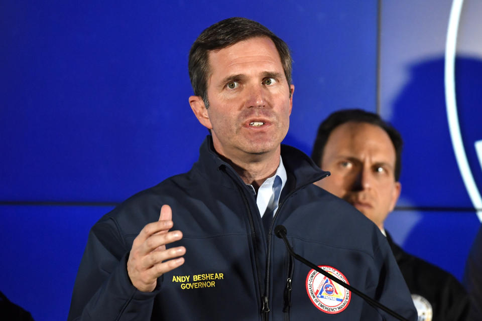 Kentucky Gov. Andy Beshear speaks to reporters during a news conference in Louisville, Ky., Monday, April 10, 2023. A shooting at the Old National Bank killed and wounded several people, according to police. The suspected shooter is also dead. (AP Photo/Timothy D. Easley)