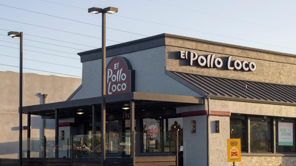 PHOTO: Exterior view of an El Pollo Loco restaurant in Huntington Beach, Calif., at dusk, on May 8, 2022. (STOCK PHOTO/Adobe Stock)