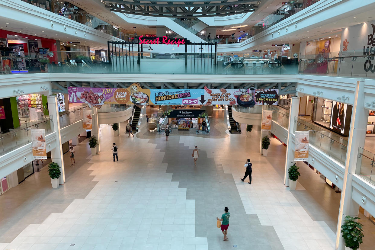 People seen at the Plaza Singapura shopping mall on 24 May 2021 amid Singapore’s Phase 2 (Heightened Alert) period. (PHOTO: Dhany Osman / Yahoo News Singapore)