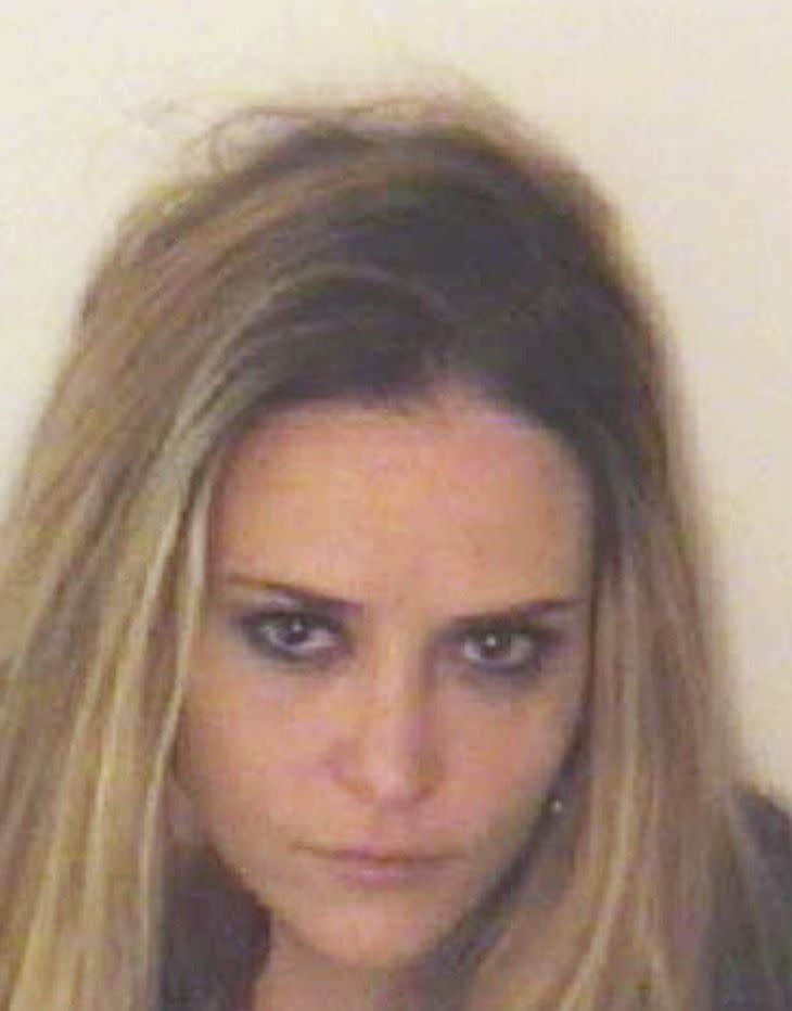 In this handout photograph supplied by the Aspen Police Department, 34-year-old Brooke Mueller poses for her mugshot after being arrested and charged with assault and possession of cocaine with intent to distribute on December 3, 2011 in Aspen, Colorado. The ex-wife of American actor Charlie Sheen was arrested in the early hours of December 3, 2011 after a woman reported an assault identifying Mueller as the assailant.