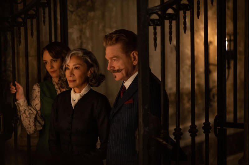 From left, Tina Fey, Michelle Yeoh and Kenneth Branagh star in "A Haunting in Venice." Photo courtesy of 20th Century Studio