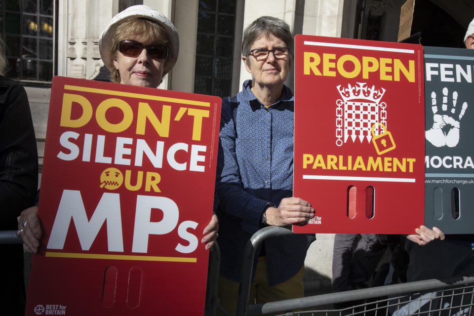 Protesters outside the Supreme Court at the beginning of a hearing to rule on the legality of suspending Parliament 