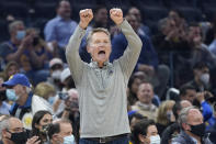 Golden State Warriors coach Steve Kerr gestures to players during the first half of the team's NBA basketball game against the Phoenix Suns in San Francisco, Friday, Dec. 3, 2021. (AP Photo/Jeff Chiu)