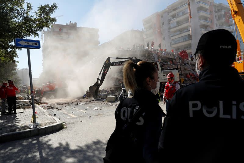 Rescue workers search for earthquake survivors in Izmir