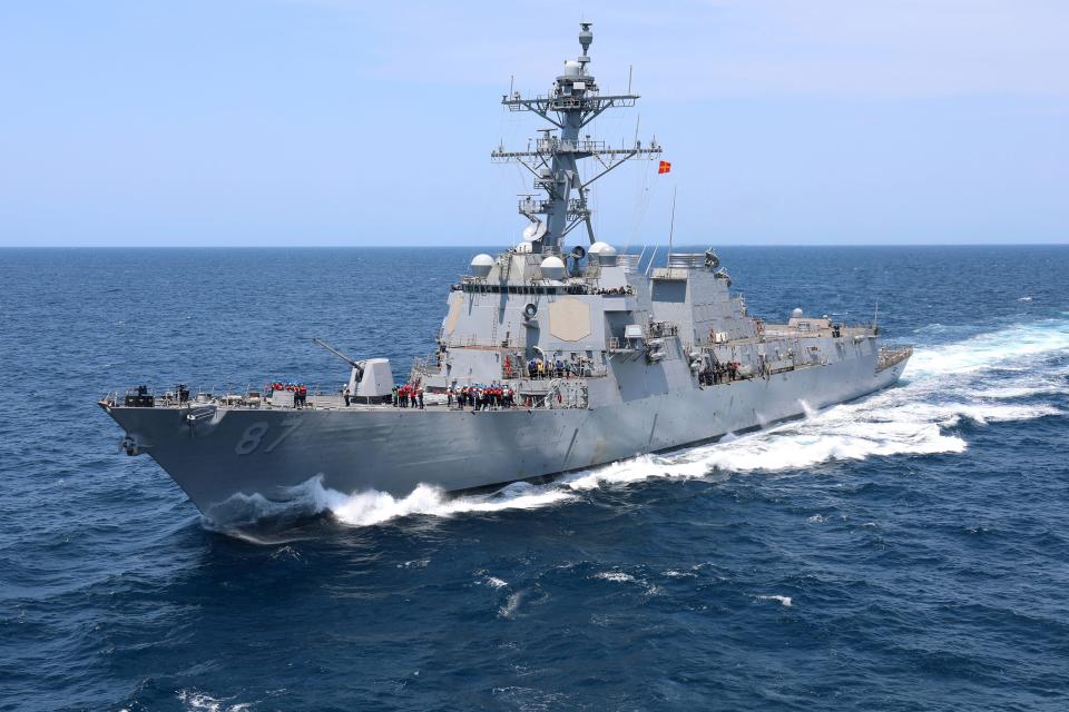 US Navy destroyer USS Mason sailing on the open ocean.