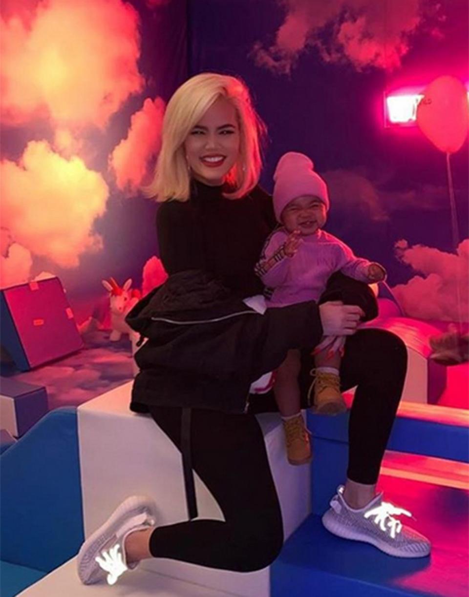 True and Khloé were all smiles while celebrating her cousin Stormi's <a href="https://people.com/parents/kylie-jenner-stormi-first-birthday-party/" rel="nofollow noopener" target="_blank" data-ylk="slk:first birthday;elm:context_link;itc:0;sec:content-canvas" class="link ">first birthday</a> at the extravagant party thrown by mom Kylie Jenner. The amusement park-themed bash was called "StormiWorld," in honor of the birthday girl's dad Travis Scott's <em>Astroworld</em> album. 