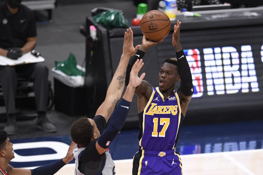 Los Angeles Lakers guard Dennis Schroder (17) shoots during the second half of an NBA basketball game.