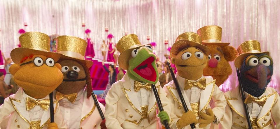 This image released by Disney shows muppet characters, from left, Scooter, Rowlf, Kermit, Walter, Fozzie and Gonzo in a scene from "Muppets Most Wanted." (AP Photo/Disney Enterprises, Inc., Jay Maidment)