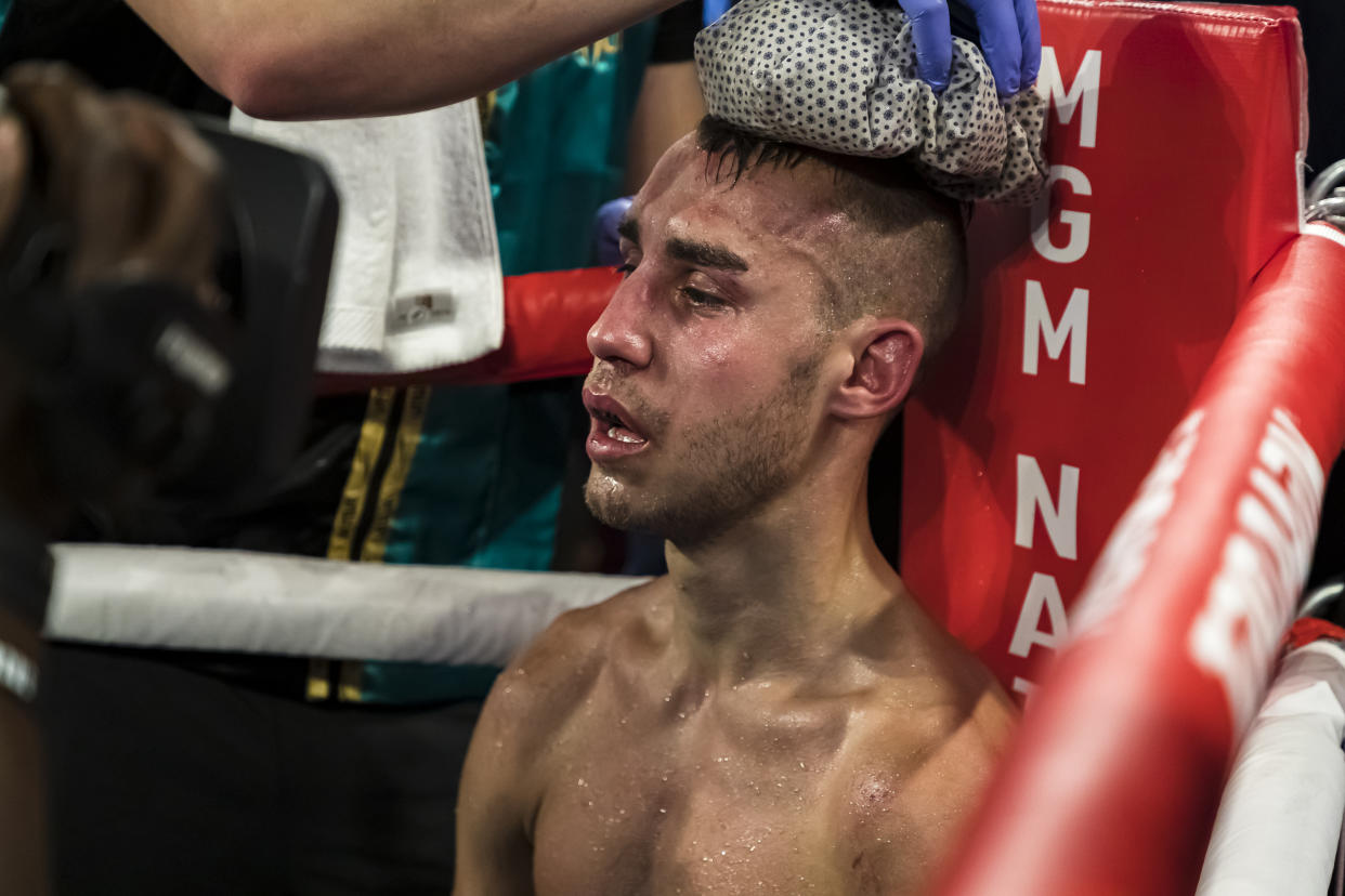 OXON HILL, MD - JULY 19: Maxim Dadashev receives attention in his corner after his corner threw in the towel following the eleventh round of his junior welterweight IBF World Title Elimination fight against Subriel Matias (not pictured) at The Theater at MGM National Harbor on July 19, 2019 in Oxon Hill, Maryland. (Photo by Scott Taetsch/Getty Images)