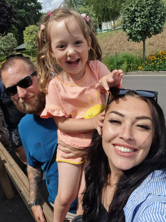 The family are now urging other parents to look out for the tell-tale signs of eye cancer, pictured Gina and Michael Hickson with their daughter. (Childhood Eye Cancer Trust/SWNS)