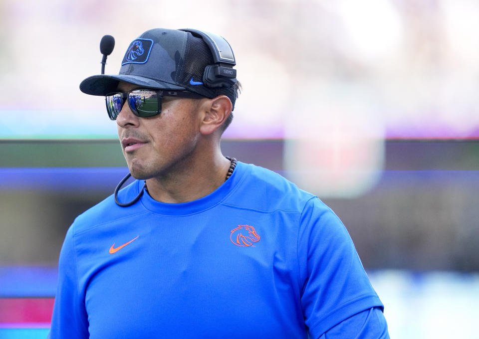 Boise State head coach Andy Avalos walks on the sideline during the first half of an NCAA college football game against Washington, Saturday, Sept. 2, 2023, in Seattle. (AP Photo/Lindsey Wasson)