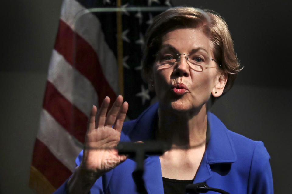 Democratic presidential candidate Sen. Elizabeth Warren, D-Mass., reads through a teleprompter during her address at the New Hampshire Institute of Politics in Manchester, N.H., Thursday, Dec. 12, 2019.(AP Photo/Charles Krupa)