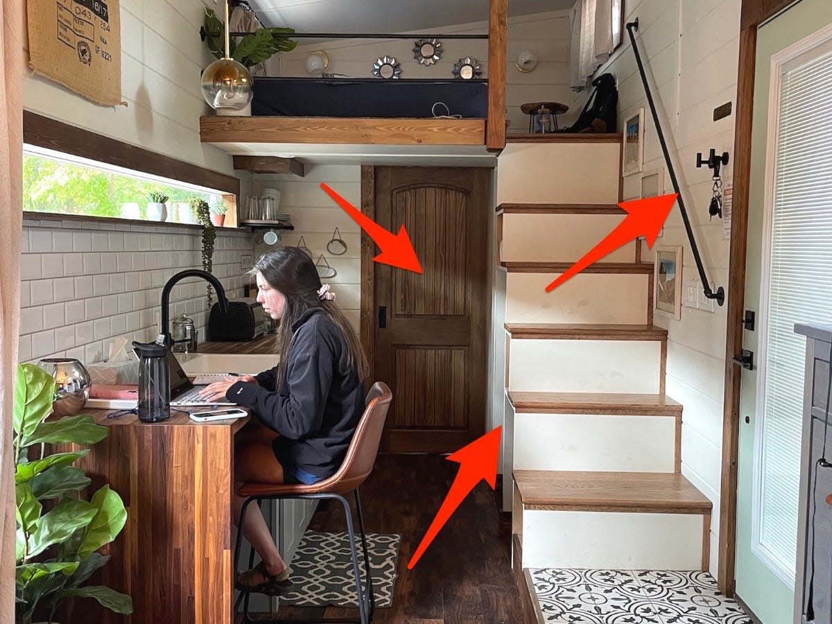 Arrows point to storage hacks inside the tiny house.