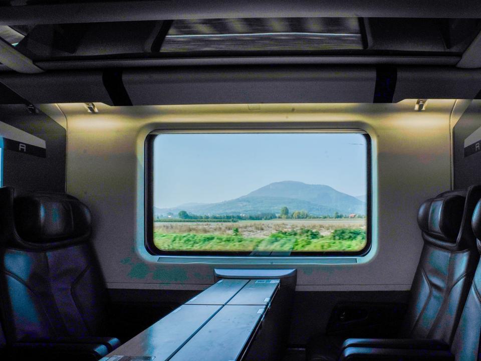 A view out the window of a train in Italy.