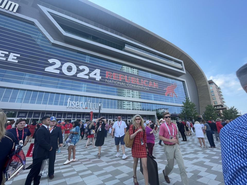 Attendees leave Fiserv Forum after Monday's Republican National Convention afternoon session.