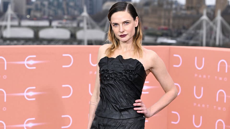 Ferguson wearing a distressed leather Lurline piece — with ghoulish skull detailing along the bustline — at the London photocall. - Jeff Spicer/Getty Images