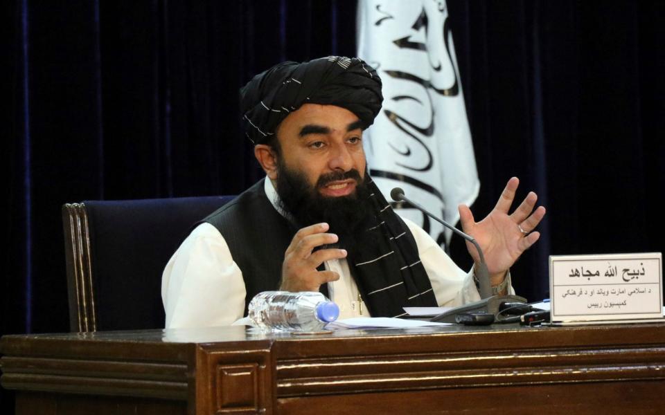Taliban spokesman Zabihullah Mujahid speaks during a press conference in Kabul - AFP/Getty Images