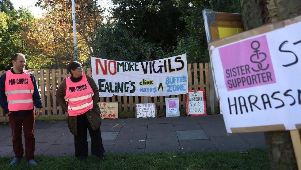 Banners supporting buffer zone around abortion clinics