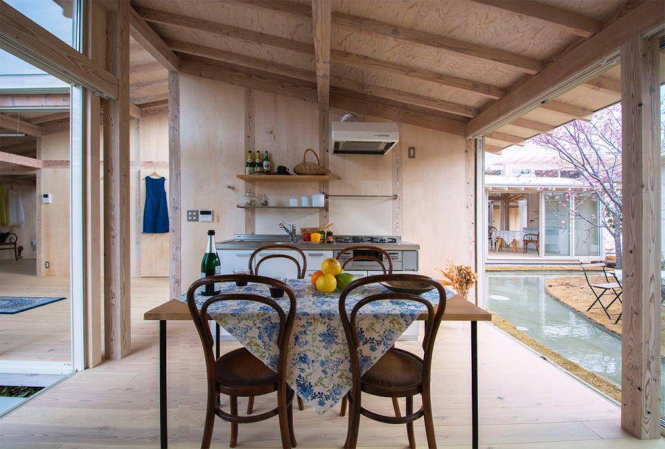 Cozy wooden kitchen area in an Awazuku House unit.