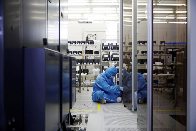 A employee works at a clean room of National Nanofab Center in Daejeon