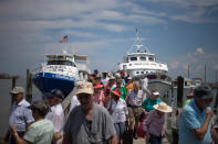 <p>Tourists arrive by ferry to Tangier Island, Virginia, Aug. 2, 2017. (Photo: Adrees Latif/Reuters) </p>