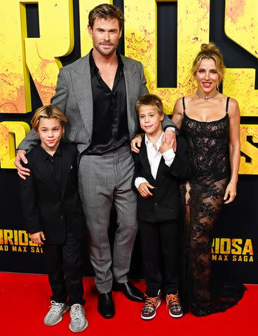 <p>James Gourley/Shutterstock</p> Chris Hemsworth and wife Elsa Pataky with their twin sons