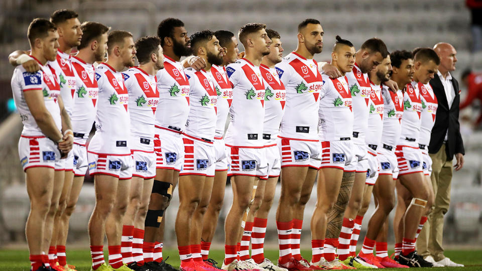 Paul McGregor and his Dragons players, pictured here before their clash with the Roosters.