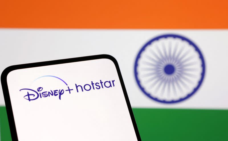Illustration shows Disney+ Hotstar logo and Indian flag