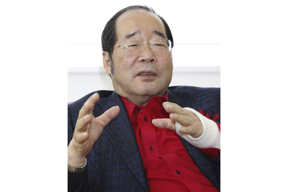 Japan's retail chain Daiso founder Hirotake Yano speaks during an interview in Tokyo, on April 23, 2019. Yano, who founded retail chain Daiso behind the 100-yen shop, Japan’s equivalent of the dollar store, has died. He was 80.(Kyodo News via AP)