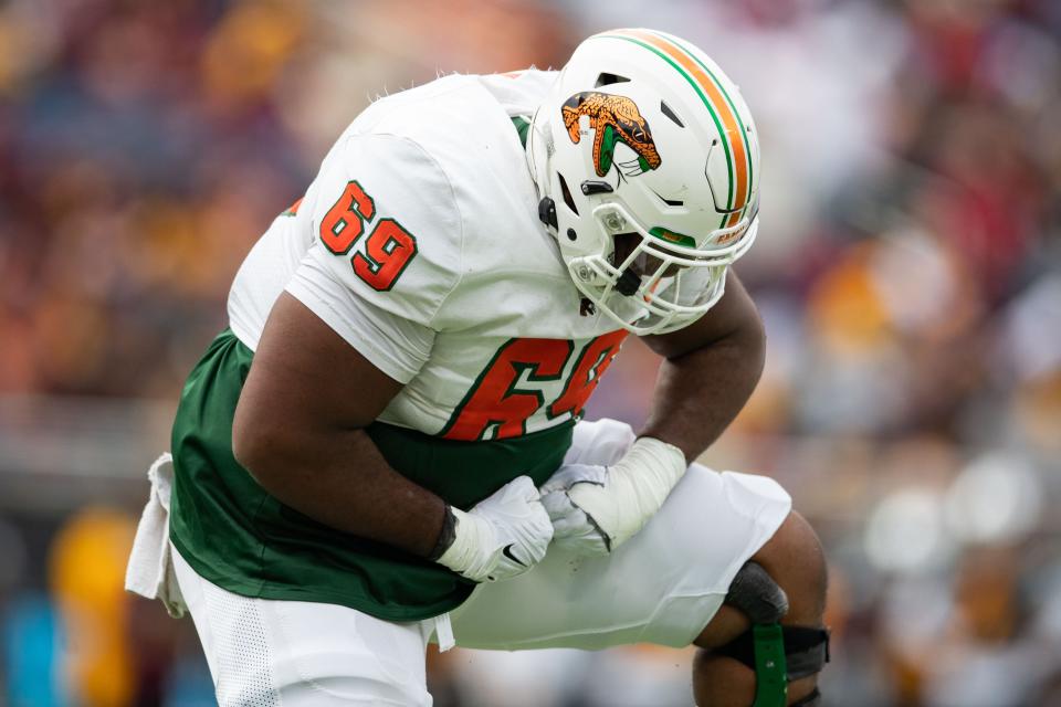 Florida A&M Rattlers offensive lineman TJ Lee (69) celebrates a play against the Bethune-Cookman Wildcats at the Florida Blue Florida Classic at Camping World Stadium in Orlando, Florida, Saturday, Nov. 19, 2022.