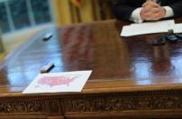 U.S. President Donald Trump sits for an interview with Reuters in the Oval Office of the White House in Washington, U.S., April 27, 2017. REUTERS/Carlos Barria