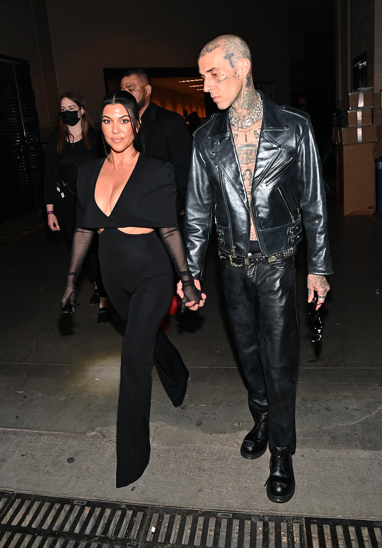 LAS VEGAS, NEVADA - APRIL 03: (L-R) Kourtney Kardashian and Travis Barker attend the 64th Annual GRAMMY Awards at MGM Grand Garden Arena on April 03, 2022 in Las Vegas, Nevada. (Photo by Denise Truscello/Getty Images for The Recording Academy)