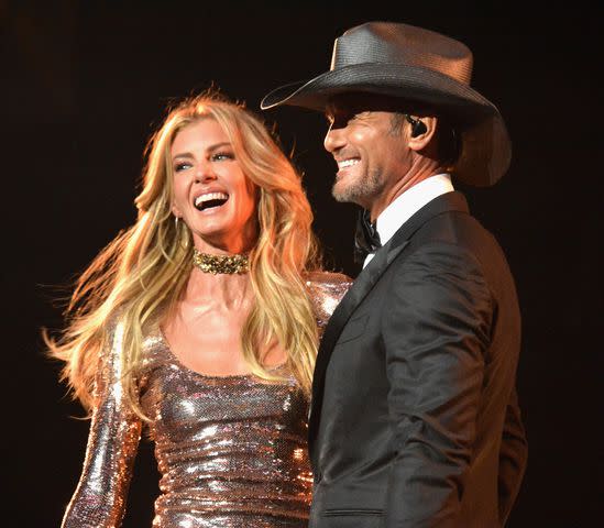 Jeff Kravitz/ACMA2017/FilmMagic for ACM Faith Hill (L) and Tim McGraw perform onstage at the 52nd Academy Of Country Music Awards at T-Mobile Arena on April 2, 2017 in Las Vegas, Nevada