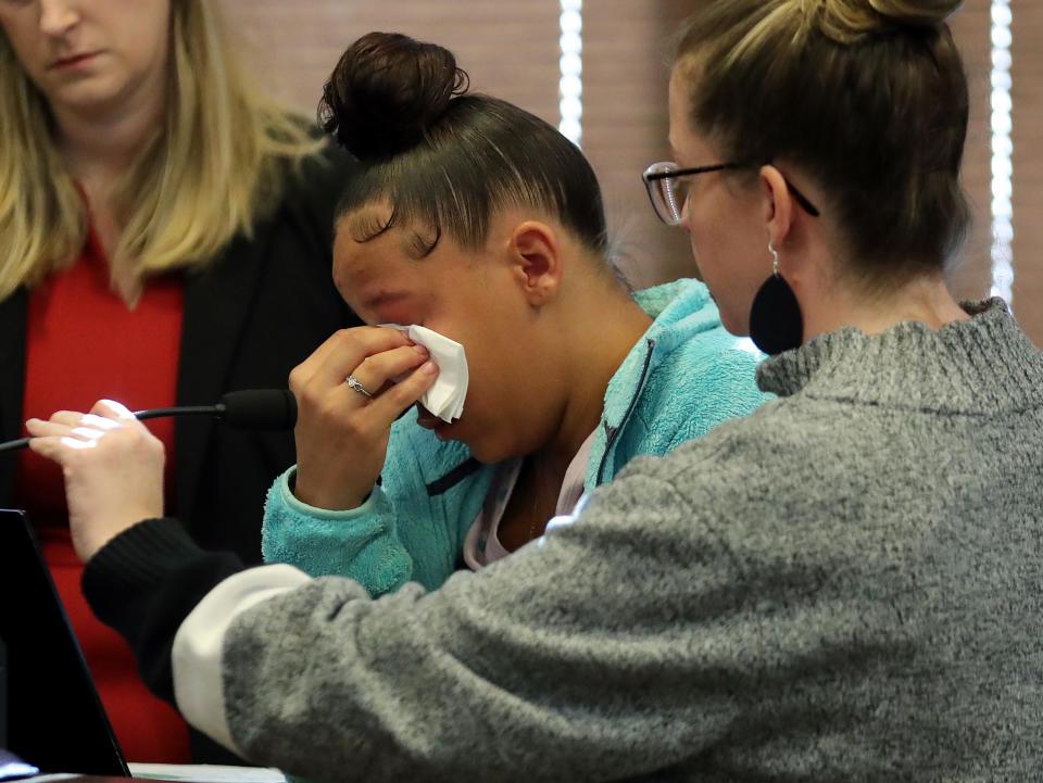 Aniyah Dayton wipes away tears as she speaks before Jessica Skinner is sentenced to prison Wednesday for the wrong-way crash that killed her mother, Lisabeth Dayton, in Summit County Common Pleas Court.