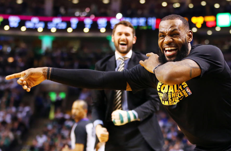 LeBron James is energized in a blowout win over the Celtics in Boston. (Getty)