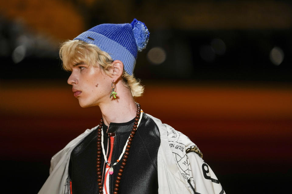 A model wears a creation as part of the Dsquared2 men's Spring Summer 2023 collection presented in Milan, Italy, Friday, June 17, 2022. (AP Photo/Luca Bruno)