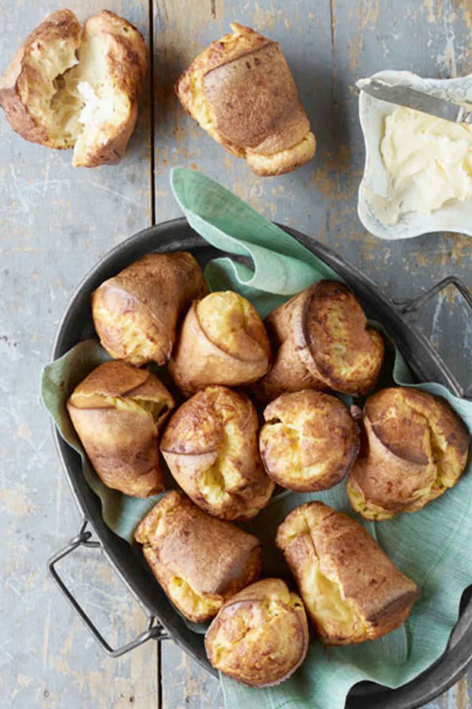 <p>Serve these cheesy bread pastries as a brunch starter.</p><p><strong><em><a href="https://www.womansday.com/food-recipes/food-drinks/recipes/a39449/cheddar-popovers-recipe-clv0413/" rel="nofollow noopener" target="_blank" data-ylk="slk:Get the Cheddar Popovers recipe.;elm:context_link;itc:0;sec:content-canvas" class="link ">Get the Cheddar Popovers recipe.</a></em></strong> </p>