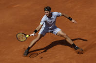 Casper Ruud of Norway returns the ball against Tomas Martin Etcheverry of Argentina during a semi final open tennis tournament in Barcelona, Spain, Saturday, April 20, 2024. (AP Photo/Joan Monfort)