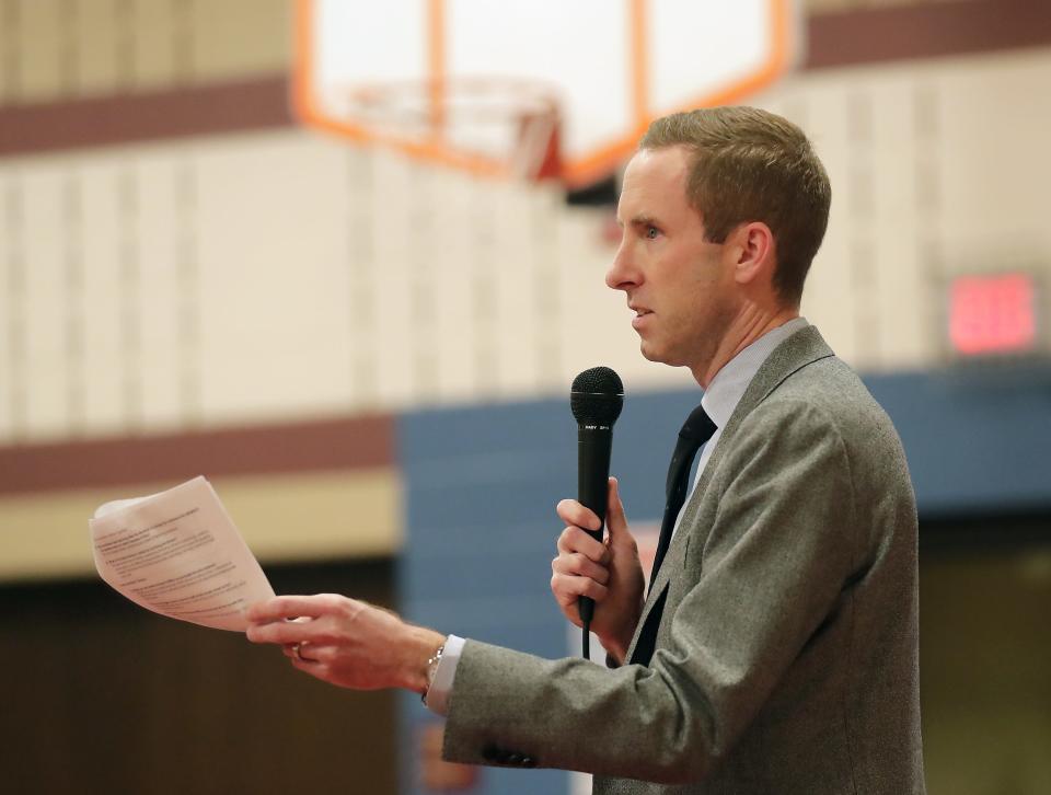 Superintendent Matt Zimmerman answers questions during a Menasha Joint School District open forum to discuss closing Jefferson Elementary School on Feb. 6.