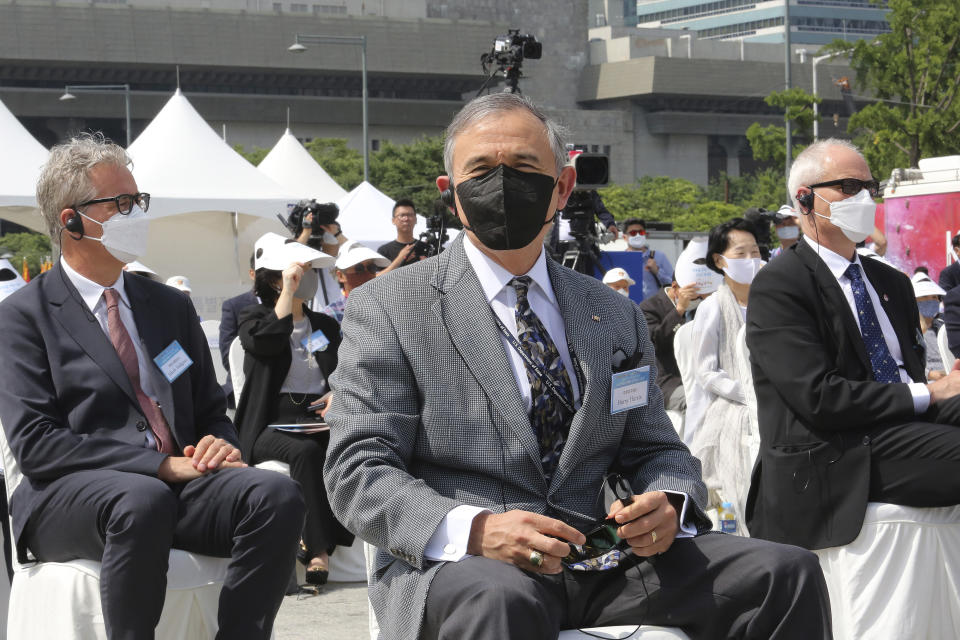 In this Monday, June 15, 2020 photo, U.S. Ambassador to South Korea Harry Harris attends a ceremony to unveil an installation artwork to commemorate the upcoming 70th anniversary of the Korean War, in Seoul, South Korea. A large Black Lives Matter banner was put up on Saturday, June 13, with Ambassador Harris tweeting that his embassy “stands in solidarity with fellow Americans grieving and peacefully protesting to demand positive change.” But the banner was taken out on Monday, June 15.(AP Photo/Ahn Young-joon)