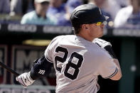 New York Yankees' Josh Donaldson hits a fielder's choice to score one run during the seventh inning of a baseball game against the Kansas City Royals Sunday, May 1, 2022, in Kansas City, Mo. (AP Photo/Charlie Riedel)