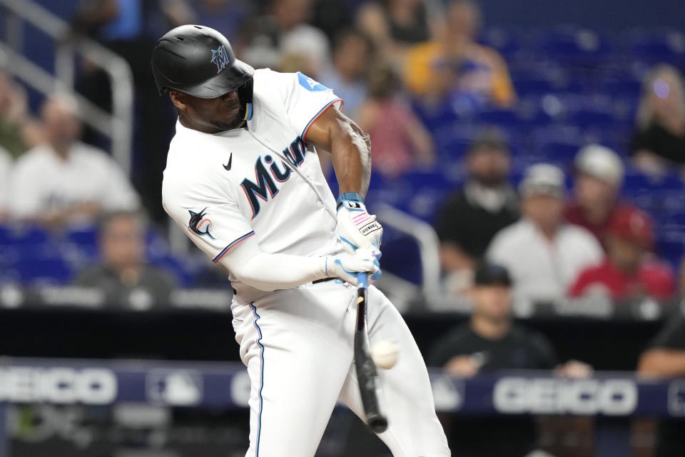 Miami Marlins' Jorge Soler hits a single against the St. Louis Cardinals during the first inning of a baseball game Wednesday, July 5, 2023, in Miami. (AP Photo/Lynne Sladky)