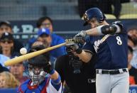 Oct 15, 2018; Los Angeles, CA, USA; Milwaukee Brewers left fielder Ryan Braun (8) strikes out in the third inning against the Los Angeles Dodgers in game three of the 2018 NLCS playoff baseball series at Dodger Stadium. Mandatory Credit: Jayne Kamin-Oncea-USA TODAY Sports