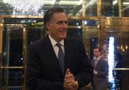 After a dinner together at a top New York restaurant, Mitt Romney offered words of praise for President-elect Donald Trump that contrasted sharply with his past criticisms