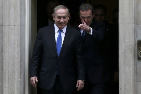 Israel's Prime Minister Benjamin Netanyahu (L) walks out of 10 Downing Street after his meeting with Britain's Prime Minister Theresa May in London, February 6, 2017. REUTERS/Neil Hall