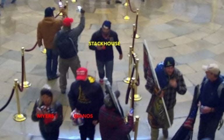 Capitol riot defendants Larry Stackhouse, Michael Gianos and Rachel Myers are shown inside the U.S. Capitol on Jan. 6, 2021.