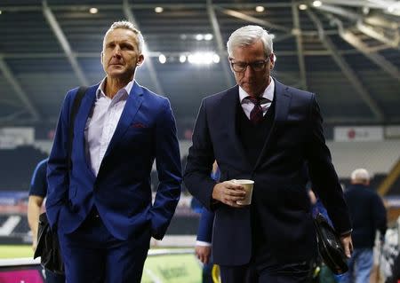 Football Soccer Britain - Swansea City v Crystal Palace - Premier League - Liberty Stadium - 26/11/16 Crystal Palace manager Alan Pardew and assistant manager Keith Millen at the end of the match Action Images via Reuters / Peter Cziborra Livepic