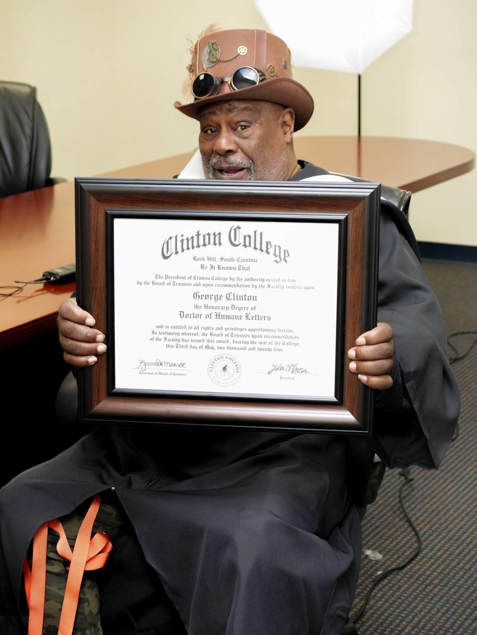 George Clinton with the honorary degree he received Friday from Clinton College in Rock Hill. Clinton is known for his funk music style and a host of awards, including a Grammy Lifetime Achievement and Rock & Roll Hall of Fame induction.